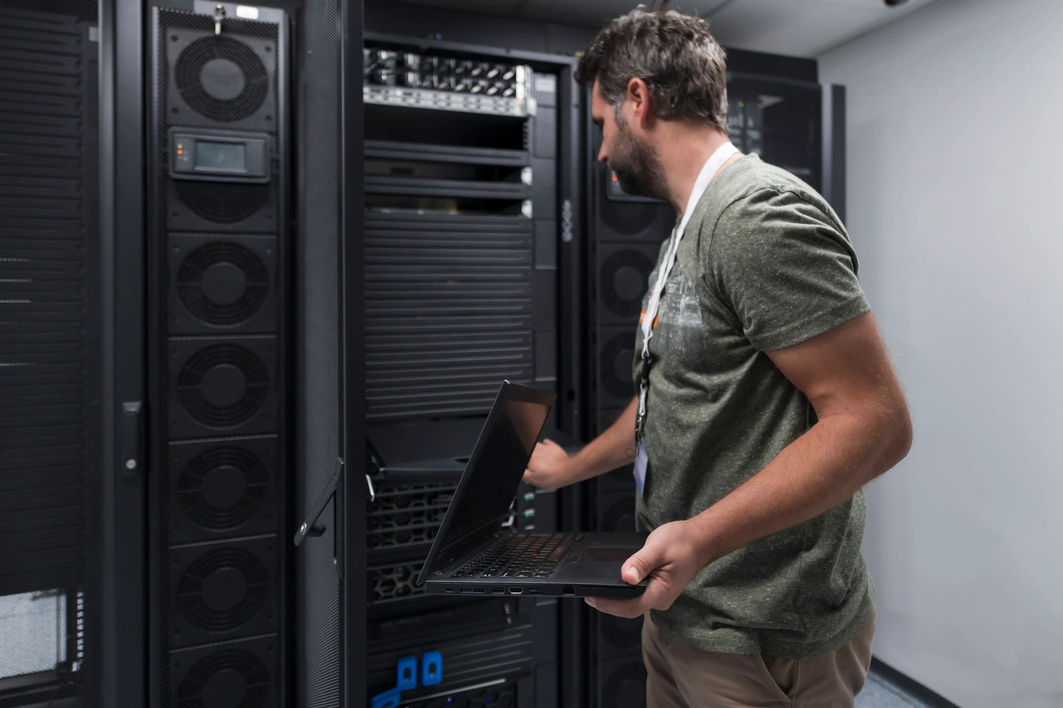 Engineer working in a high-performance data center environment