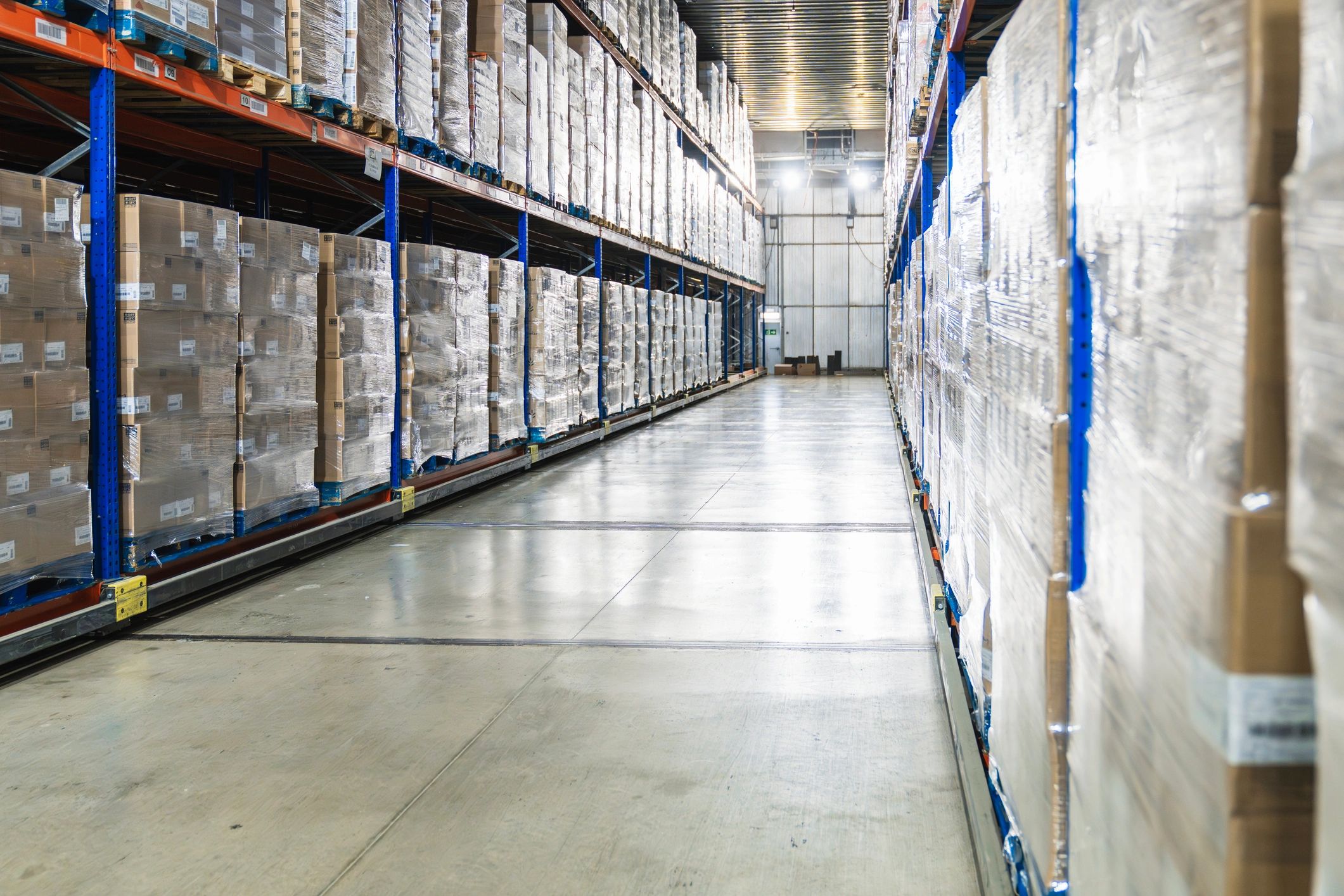 Aisle of server rack cabinets in a modern data center