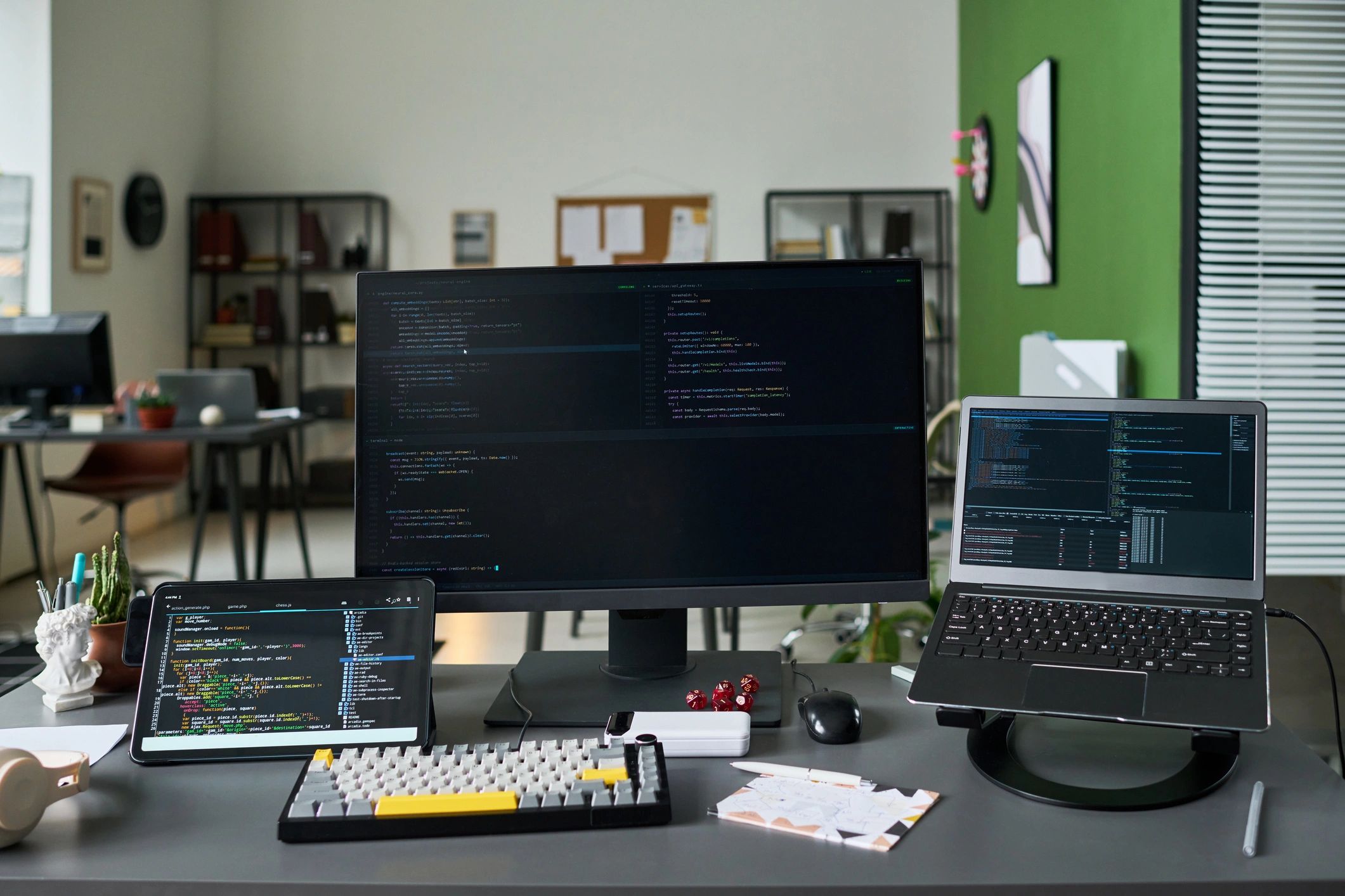 Technical workspace with screens and development tools representing focused product work